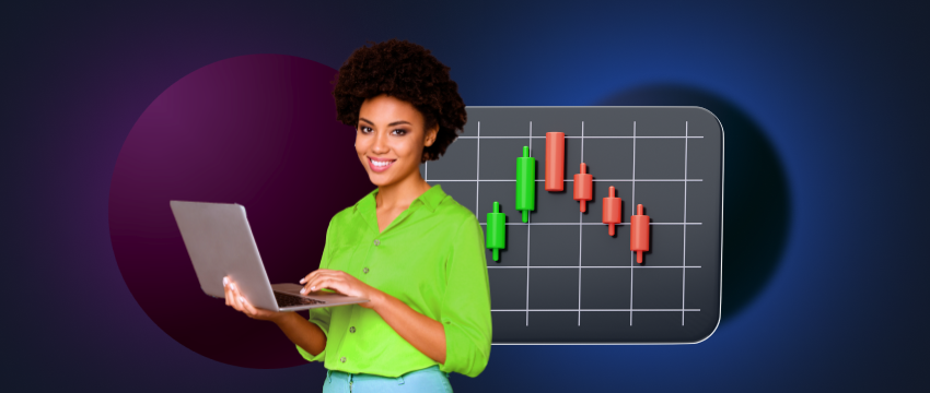 A woman examines a chart on her laptop, representing the analytical approach of momentum traders in investing.